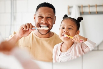 Toothbrush and toothpaste representing good daily oral hygiene